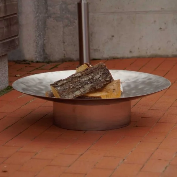 Hestia stainless steel fire pit can be ordered with removable 60cm diameter barbecue grill and its holder.